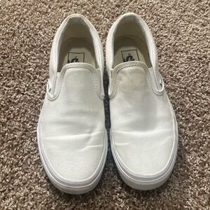 Vans White slip ons